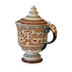 Un service de table "Longwy modèle Henri II" en faïence "terre de fer"