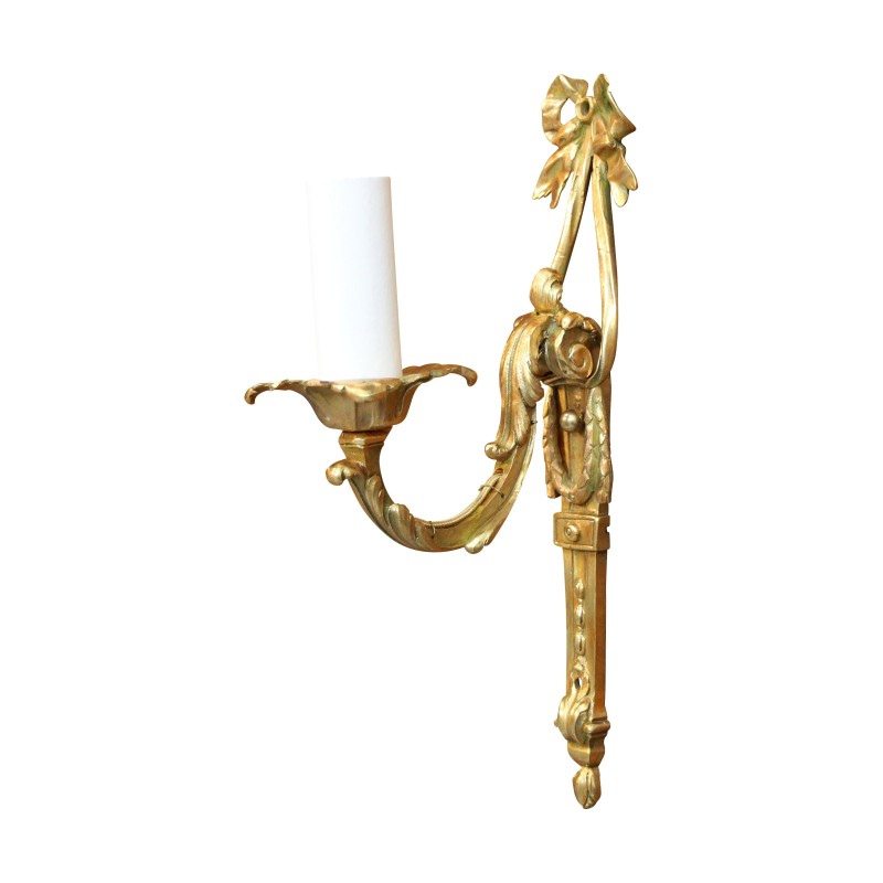 Eine Leuchte im Louis XVI-Stil aus vergoldeter Bronze und alter Patina - Moinat - Wandleuchter