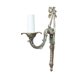 A Louis XVI style light fixture in silvered bronze and old patina