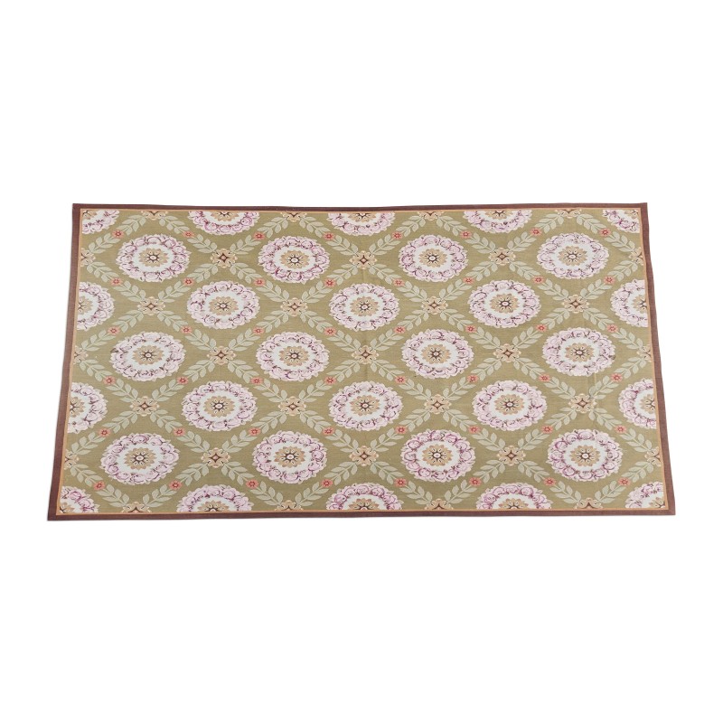 Un tapis "Aubusson", coloris vert, rose, marron et noir - Moinat - Tapis