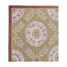 Un tapis "Aubusson", coloris vert, rose, marron et noir - Moinat - Tapis