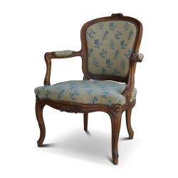 A pair of Louis XV cabriolet armchairs in walnut, \"Nogaret\" model