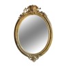 A richly molded Napoleon III oval mirror in gilded wood, mercury glass - Moinat - Mirrors