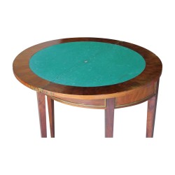 A half-moon mahogany table with a rotating game board