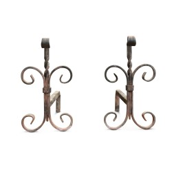 A pair of wrought iron andirons.