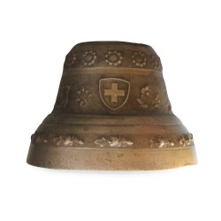 Une petite cloche en bronze avec collier en cuir. Suisse