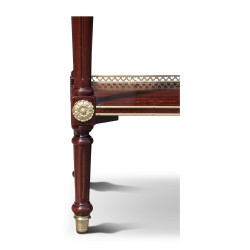 A Louis XVI mahogany server mounted on oak, richly crafted