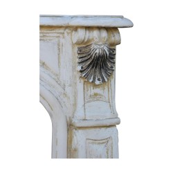 Baroque Louis XV fireplace in used painted stucco.