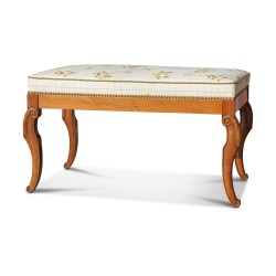 A mahogany bench with palmette empire legs