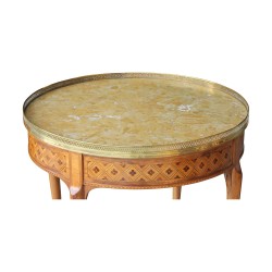 A Louis XV - Louis XVI transitional center bouillotte sofa end table, richly inlaid