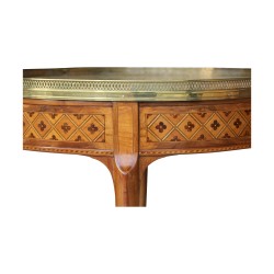 A Louis XV - Louis XVI transitional center bouillotte sofa end table, richly inlaid