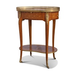 A pair of richly inlaid rosewood oval bedside tables mounted on oak. Paris