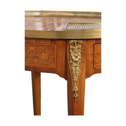 A pair of richly inlaid rosewood oval bedside tables mounted on oak. Paris