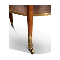 A pair of richly inlaid rosewood oval bedside tables mounted on oak. Paris