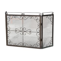 A wrought iron fire screen, three panels.