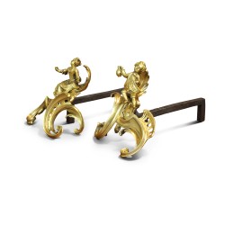 A Louis XV rocaille fireplace accessory \"Aux Pontys\" in gilded bronze