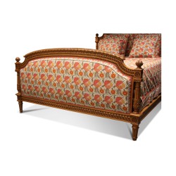 A complete Louis XVI bed in richly carved beech