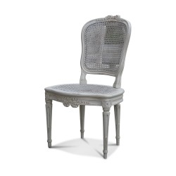 Un lot de cinq assises Louis XVI "Au ruban" en hêtre. Hauteur assise : 43 cm.