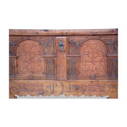 A richly carved fir chest, \"Gstaad Valley\" style, with a lock and storage box. Circa 1732