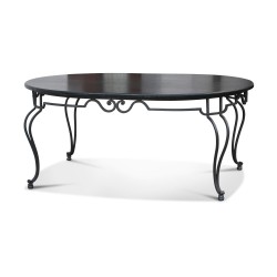 Oval table, in the style of \"Gilbert Poillerat\", in iron …