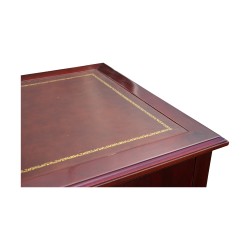 Un bureau plat directoire, plateau dessus cuir avec deux tirettes et cinq tiroirs.