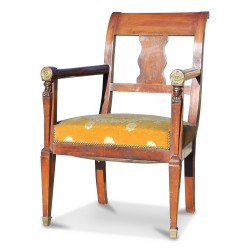 Un fauteuil directoire en acajou recouvert d’un velours laine Empire \"retour d’Egypte\".