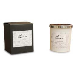 Une bougie parfumée "Nuit d’Orient" by Moinat. Mèche coton et cire végétale