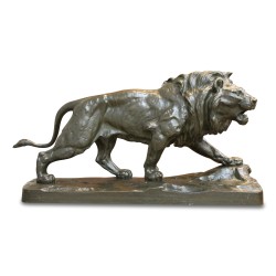 Bronze "Lion marchant" signé Paul Thomas (1859-1910). Paris