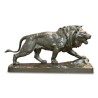 Bronze \"Lion marchant\" signé Paul Thomas (1859-1910). Paris - Moinat - Изделия из бронзы