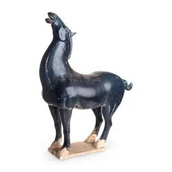 \"Tang Horse\" sculpture in terracotta, blue color.