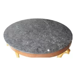 Empire \"Eagle s Head\" pedestal table in mahogany and gilded wood.