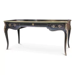 Louis XV flat desk \"Poitou Model\" in black lacquered wood decorated with gilded bronze.