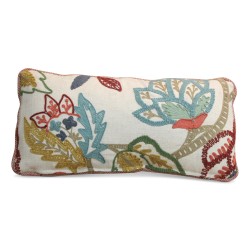 Decorative cushion in cotton, embroidered with wool, with feathers inside.
